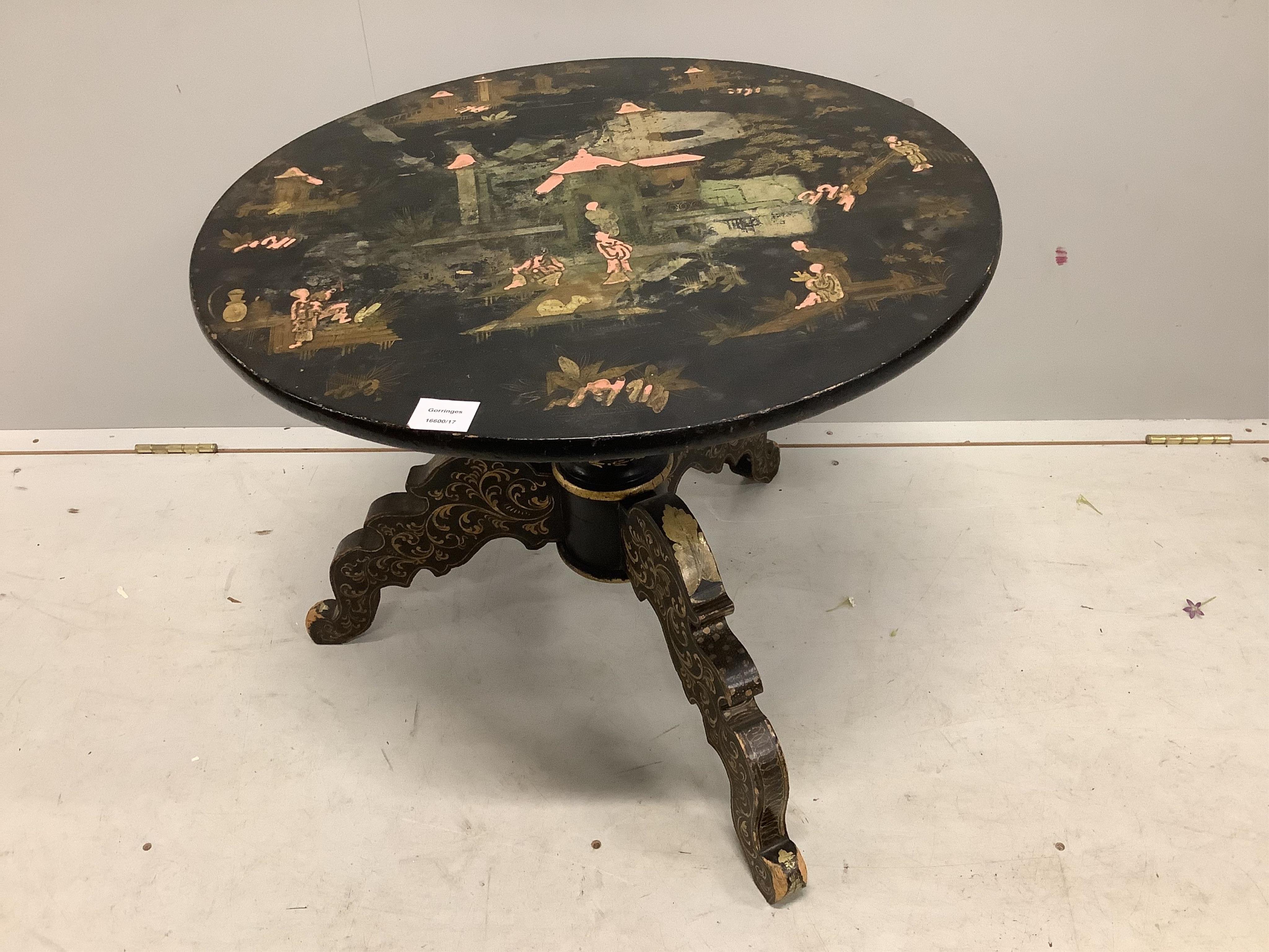 A 19th century chinoiserie lacquered circular tilt top tripod table, diameter 65cm, height 54cm, (reduced). Condition - poor